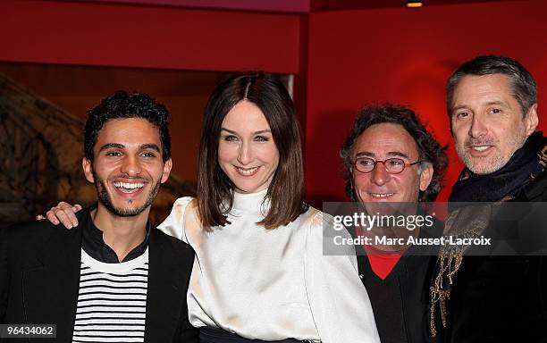 Mehdi Dehbi and Elsa Zylberstein and Jean-Jacques Zilbermann and Antoine de Caunes poses at the premiere of "'La Folle Histoire d'Amour de Simon...