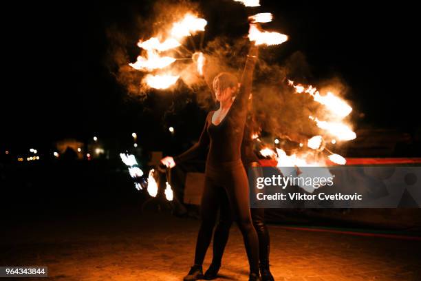 Acrobat Using Fire Acrobat With Hot Photos and Premium High Res Pictures - Getty Images