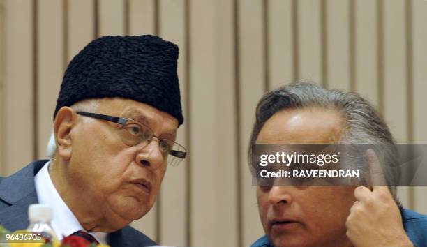 Indian Minister State for Environment and Forests Jairam Ramesh speaks with Indian Energy Minister Farooq Abdullah during The World Sustainable...