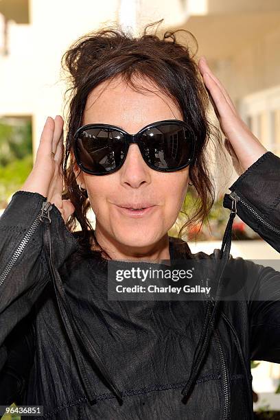 Actress Jane Adams wearing Valentino 5688s sunglasses poses with the Solstice Sunglass Boutique and Safilo USA during the HBO Luxury Lounge in honor...