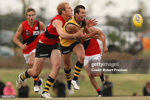 Ben Cousins handballs under pressure during a Richmond Tigers intra-club AFL match at Highgate Reserve on February 5, 2010 in Melbourne, Australia.