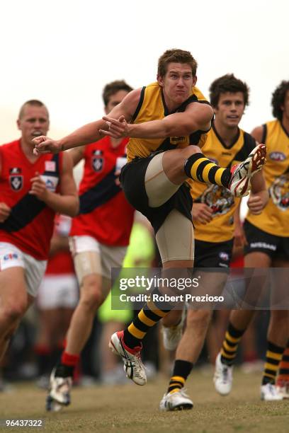 Matt White kicks during a Richmond Tigers intra-club AFL match at Highgate Reserve on February 5, 2010 in Melbourne, Australia.