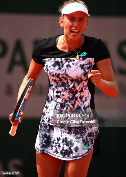 Elise Mertens of Belgium celebrates winning the first set during her ladies singles second round match against Heather Watson of Great Britain during...