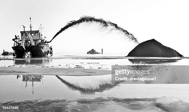 dredge in action on the river - suction dredge stock pictures, royalty-free photos & images