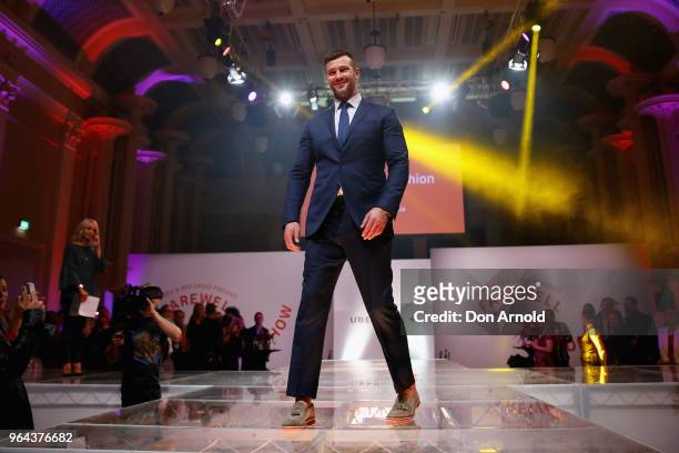 Kris Smith struts the catwalk during the Uber x Red Cross Farewell Fashion Show on May 31, 2018 in Sydney, Australia.