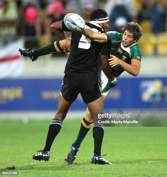 Steven Hunt of South Africa gets a pass away as he is tackled by Lote Raikabula of New Zealand in the match between New Zealand and South Africa...