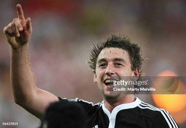 Kurt Baker of New Zealand celebrates his try in the match between New Zealand and South Africa during day one of the Wellington IRB Sevens at Westpac...