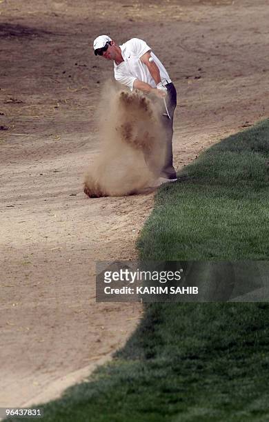 Paul Casey of England competes in the first round of the 2.5 million dollars Dubai Desert Classic golf tournament at the Emirates Golf Club on...