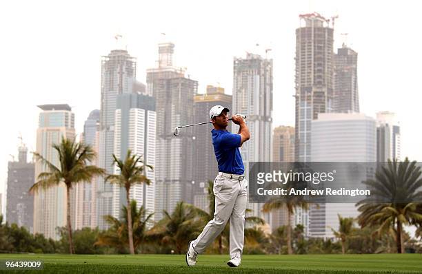 Paul Casey of England hits his second shot on the 13th hole during the second round of the Omega Dubai Desert Classic on February 5, 2010 in Dubai,...