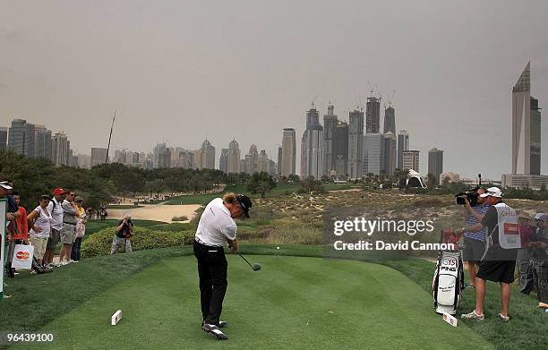 Miguel Angel Jimenez of Spain plays his tee shot at the 8th hole during the second round of the 2010 Omega Dubai Desert Classic on the Majilis Course...