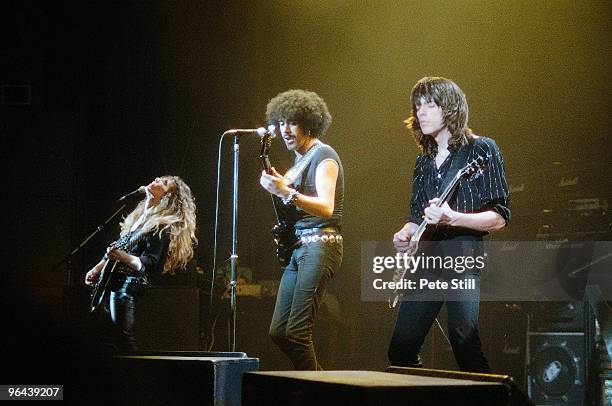 John Sykes, Phil Lynott and Scott Gorham of Thin Lizzy perform on stage, on the 'Thunder and Lightning' tour at Hammersmith Odeon on March 10th, 1983...