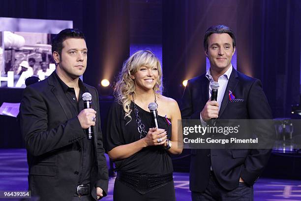 Hosts George Stroumboulopoulos, Cheryl Hickey and Ben Mulroney inside the studio during rehearsals for the Canada for Haiti Benefit on January 22,...