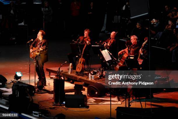 Tom Waits performs with the Kronos Quartet on stage at the Bridge School Benefit Concert 2007 held at the Shoreline Amphitheatre in Mountain View,...