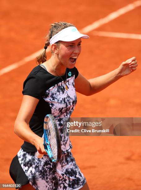 Elise Mertens of Belgium celebrates winning the match during her ladies singles second round match against Heather Watson of Great Britain during day...