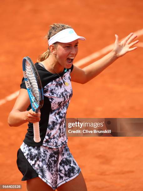 Elise Mertens of Belgium celebrates winning the match during her ladies singles second round match against Heather Watson of Great Britain during day...