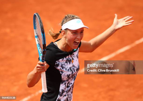 Elise Mertens of Belgium celebrates winning the match during her ladies singles second round match against Heather Watson of Great Britain during day...