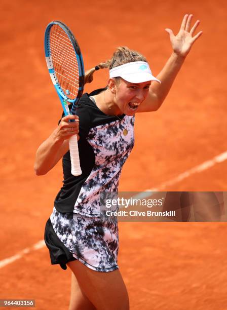 Elise Mertens of Belgium celebrates winning the match during her ladies singles second round match against Heather Watson of Great Britain during day...