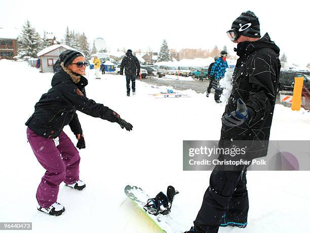 Paris Hilton and Doug Reinhardt attend Oakley "Learn To Ride" Snowboard fueled by Muscle Milk at Oakley Lodge on January 23, 2010 in Park City, Utah.