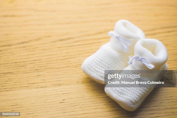 baby booties - baby care stock pictures, royalty-free photos & images