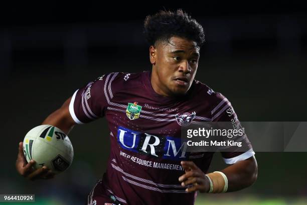 Moses Suli of the Sea Eagles makes a break during the round 13 NRL match between the Manly Sea Eagles and the North Queensland Cowboys at Lottoland...