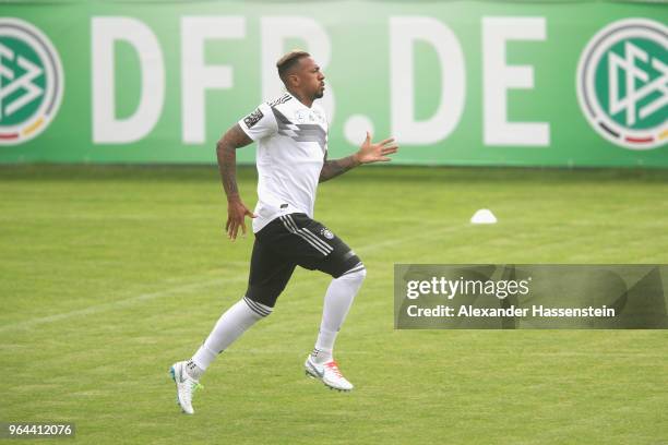 Jerome Boateng runs during a training session of the German national team at Sportanlage Rungg on day nine of the Southern Tyrol Training Camp on May...