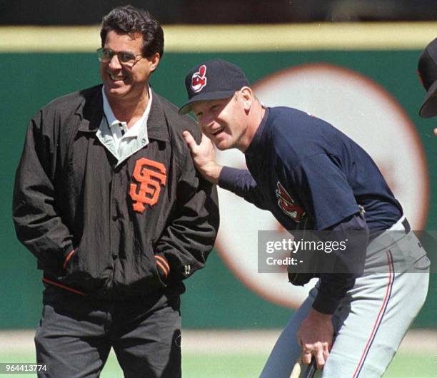 The Cleveland Indians' third-baseman Matt Williams jokes with Stan Conte, San Francisco Giants Coordinator of Strength and Rehabilitation, before the...