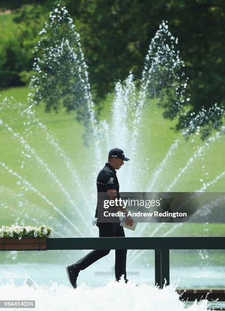 Matt Wallace of England walks across a bridge on the 9th hole during day one of the Italian Open at Gardagolf CC on May 31, 2018 in Brescia, Italy.