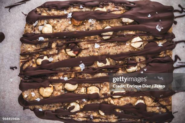 salted caramel chocolate hazelnut slab close up 3 - caramel block stock pictures, royalty-free photos & images