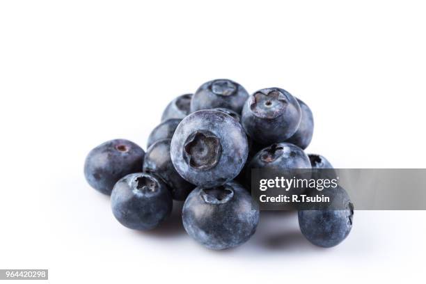 group of fresh juicy blueberries isolated on white background - blåbär bildbanksfoton och bilder