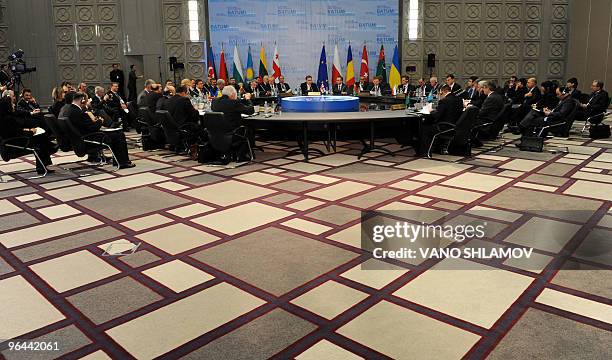 Georgian Prime Minister Nika Gilauri speaks at a round table discussion during an energy summit in the Black Sea port city of Batumi on January 14,...