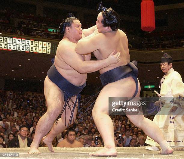 Takanohana and Asashoryu competes in the day eleven of the Grand Sumo Autumn Tournament at Ryogoku Kokugikan on September 18, 2002 in Tokyo, Japan.