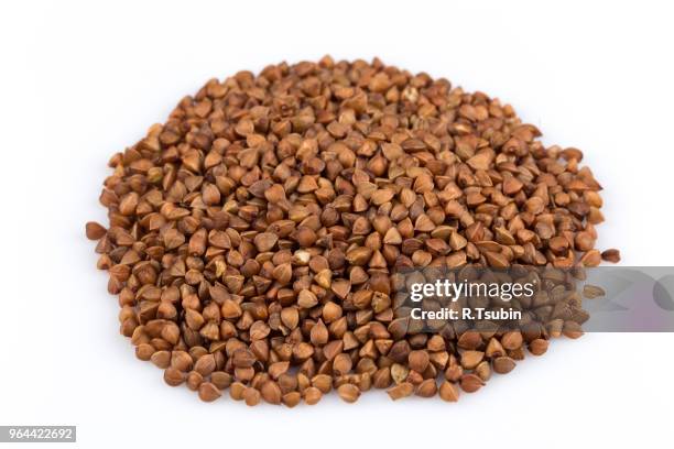 pile of buckwheat seeds isolated over the white background - buckwheat isolated stock pictures, royalty-free photos & images