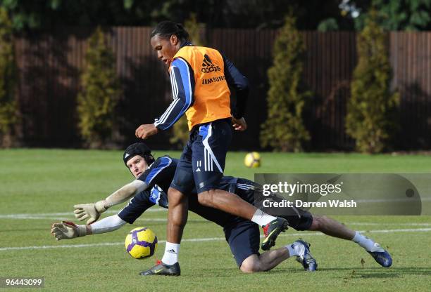 Didier Drogba and Petr Cech of Chelsea during a training session at the Cobham Training Ground on February 5, 2010 in Cobham, United Kingdom.
