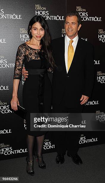 Actor Mel Gibson and Oksana Grigorieva attend the film premiere of "Edge Of Darkness" at Cinema UGC Normandie on February 4, 2010 in Paris, France.