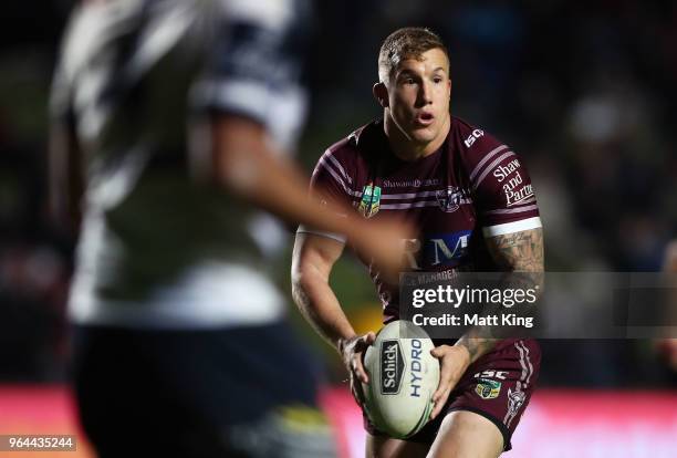Trent Hodkinson of the Sea Eagles runs with the ball during the round 13 NRL match between the Manly Sea Eagles and the North Queensland Cowboys at...