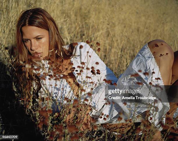 Actor Rhona Mitra poses for a portrait shoot in Los Angeles on September 19, 2001.