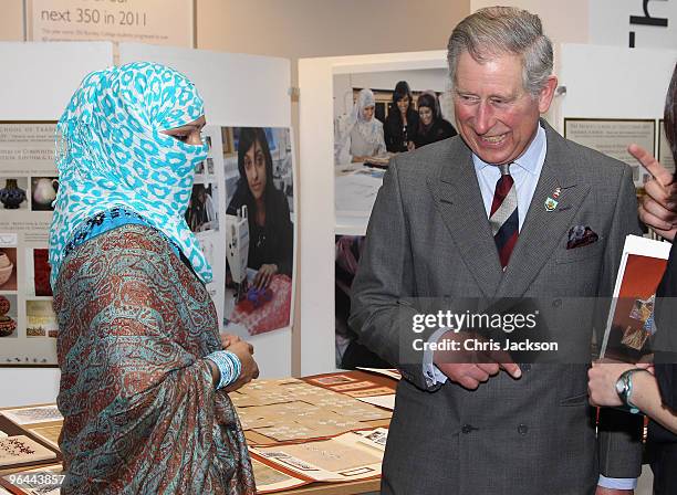 Prince Charles, Prince of Wales meets Rabia Sharif, a student on the Eastern Design Course as he visits Burnley College / University of Central...