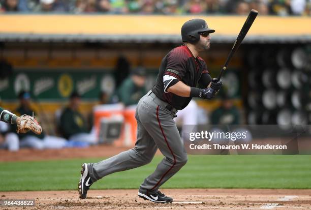 Alex Avila of the Arizona Diamondbacks bats against the Oakland Athletics in the top of the second inning at the Oakland Alameda Coliseum on May 26,...