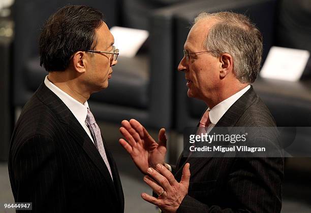 Chinese Foreign Minister Yang Jiechi talks to conference chairman Wolfgang Ischinger during the first day of the 46th Munich Security Conference at...