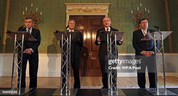 Britain's Prime Minister Gordon Brown , Northern Ireland's First Minister and DUP leader Peter Robinson and Ireland's Taoiseach Brian Cowen listen as...