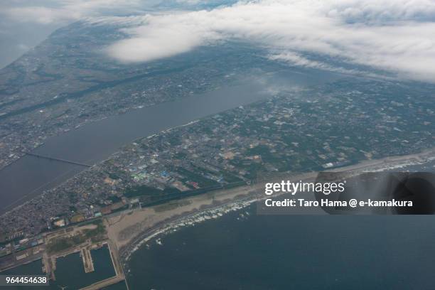 pacific ocean, choshi city in chiba prefecture and kamisu city in ibaraki prefecture in japan daytime aerial view from airplane - kamisu stock pictures, royalty-free photos & images