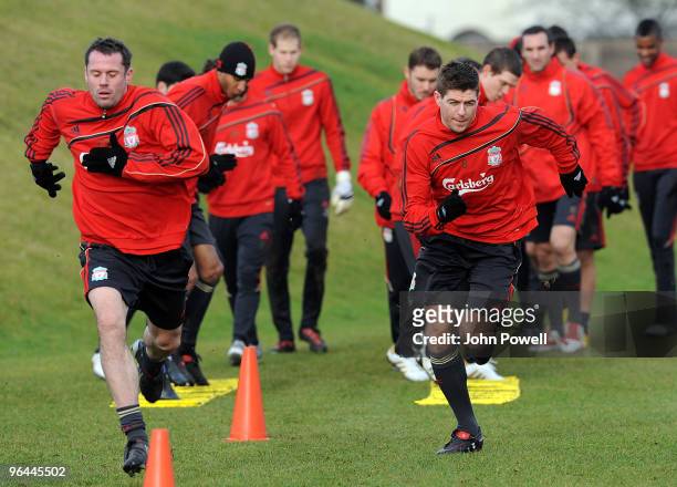 Jamie Carragher and Captain Steven Gerrard during a Liverpool FC training session at Melwood Training Ground on February 5, 2010 in Liverpool,...