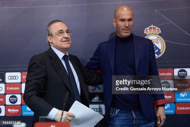 Real Madrid CF president Florentino Perez and Zinedine Zidane shake hands after a press conference to announce his resignation as Real Madrid manager...
