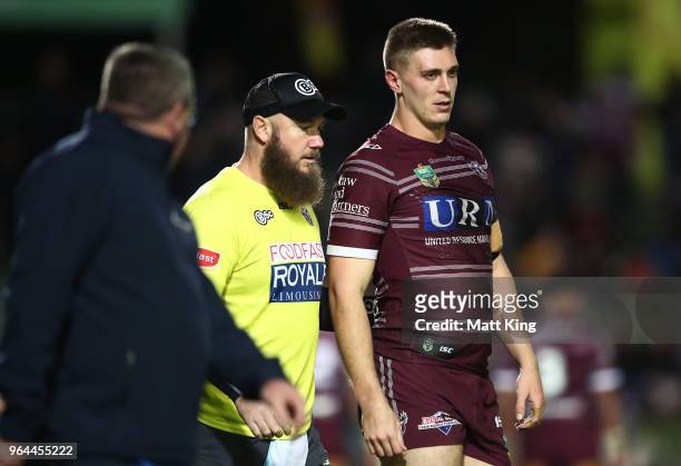 Shaun Lane of the Sea Eagles leaves the field with an injury during the round 13 NRL match between the Manly Sea Eagles and the North Queensland...