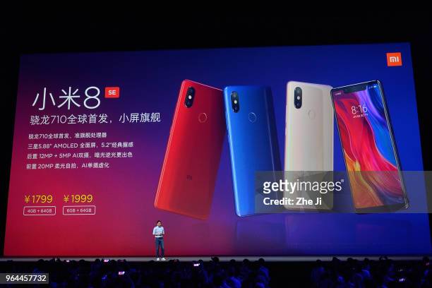 Lei Jun, chief executive officer of Xiaomi Corp., presents the company's Mi 8 SE smartphone during the Xiaomi Launches Its Flagship Products In...