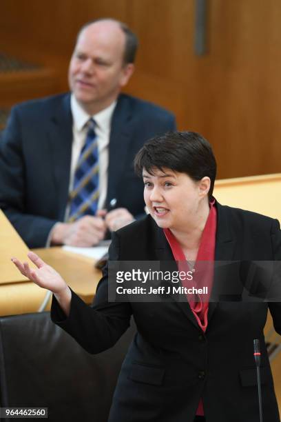 Leader of the Scottish Conservatives Ruth Davidson reacts during first minister's questions in the Scottish Parliament on March 31, 2018 in...