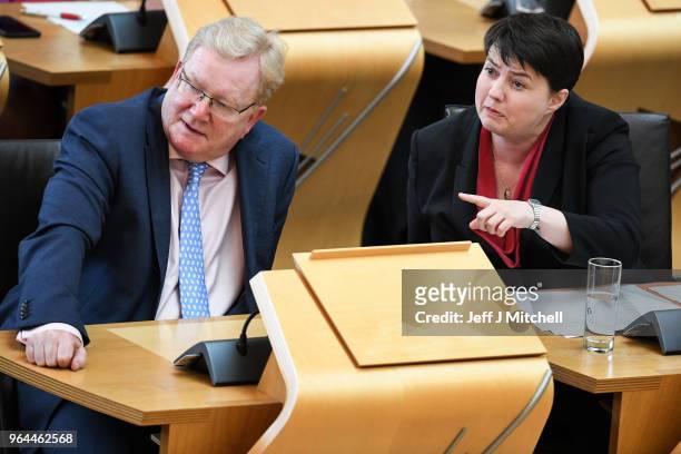 Er of the Scottish Conservatives Ruth Davidson reacts during first minister's questions in the Scottish Parliament on March 31, 2018 in Edinburgh,...