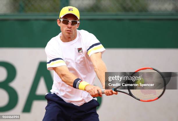 John Peers of Australia, partner of Henri Kontinen of Finland in action during their mens doubles first round match against Damir Dzumhur of Bosnia...