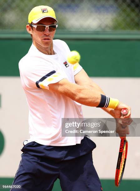 John Peers of Australia, partner of Henri Kontinen of Finland in action during their mens doubles first round match against Damir Dzumhur of Bosnia...