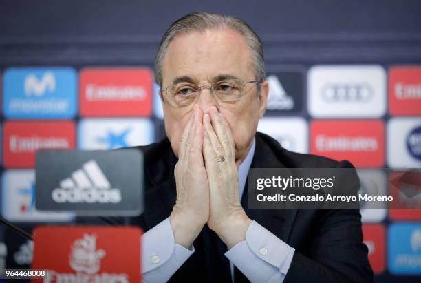 Real Madrid CF president Florentino Perez reacts as he listens to Zinedine Zidane during a press conference to announce his resignation as Real...